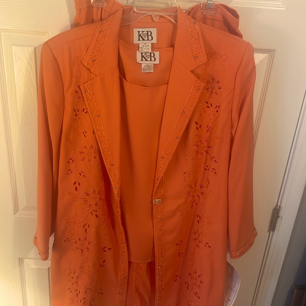 Turn heads with this gorgeous peach church skirt suit.